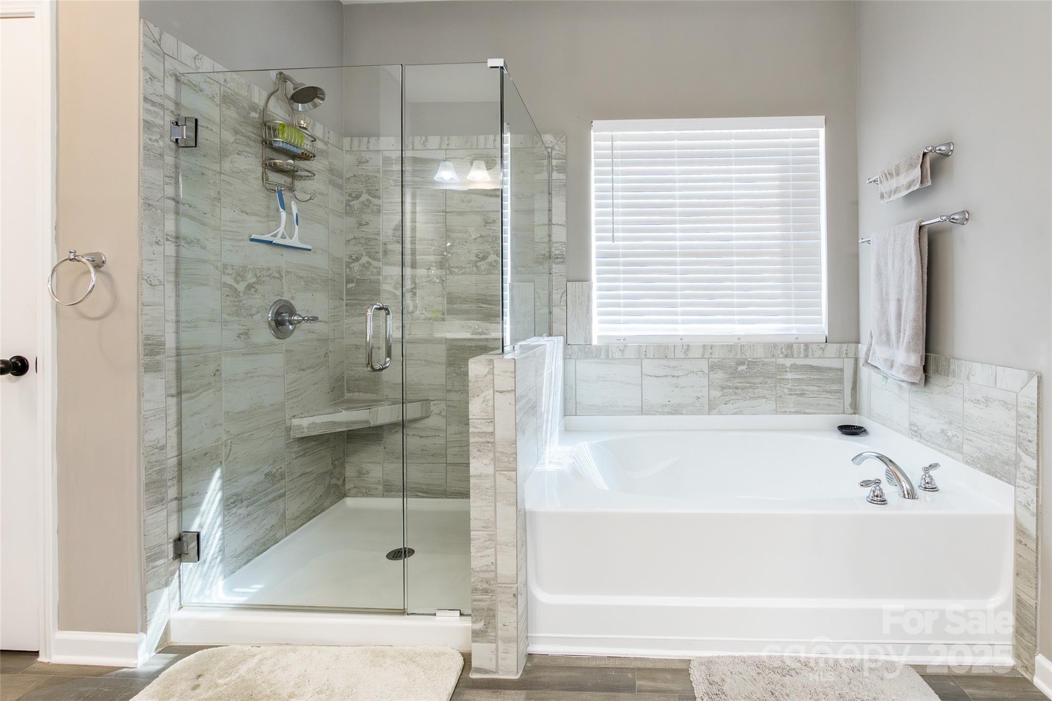200 Clauser Road South Mount Holly, NC 28120 - Photo 24 of 44 a bathroom with a bathtub and shower