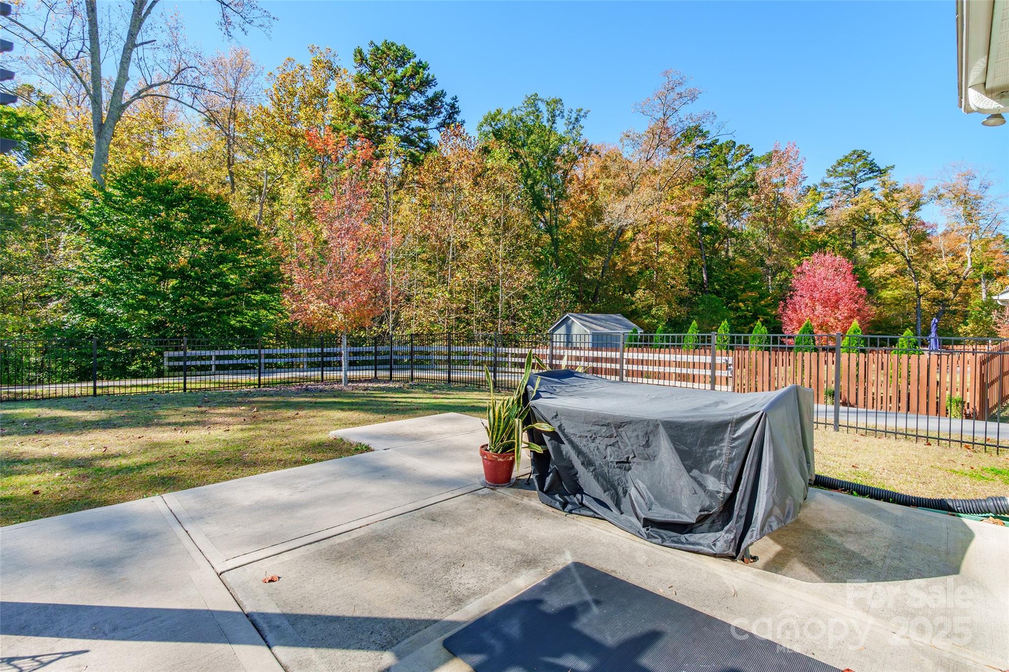 200 Clauser Road South Mount Holly, NC 28120 - Photo 34 of 44 a view of a swimming pool with a patio and a yard