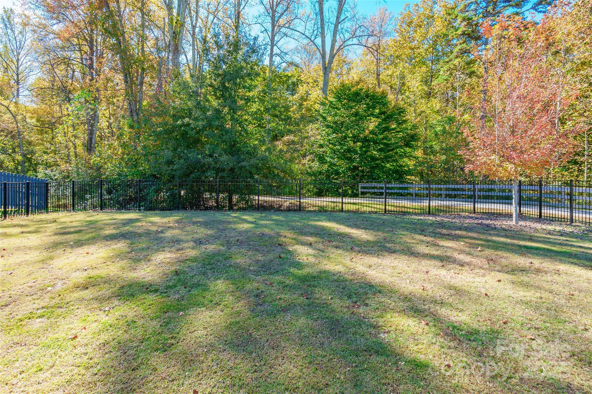 200 Clauser Road South Mount Holly, NC 28120 - Photo 36 of 44 a view of a tennis ground with large trees