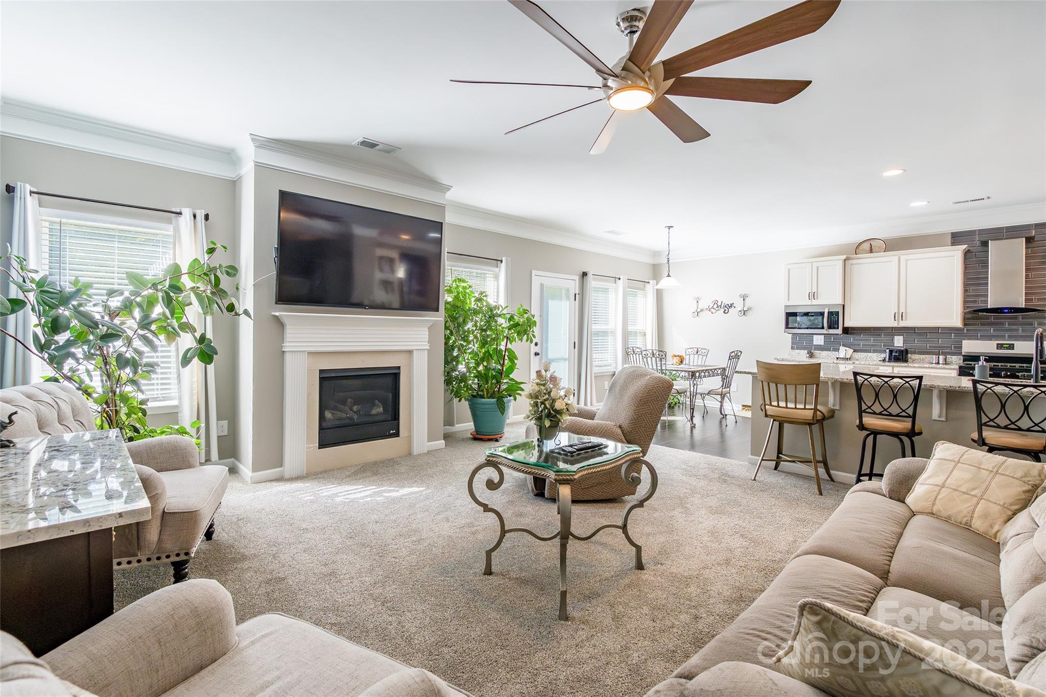 200 Clauser Road South Mount Holly, NC 28120 - Photo 10 of 44 a living room with furniture and a fireplace