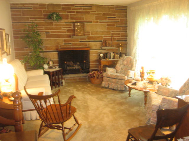 224 East Harrison Road Lombard, IL 60148 - Photo 2 of 24 a view of a patio with dining table and chairs