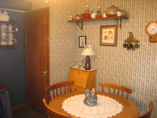 224 East Harrison Road Lombard, IL 60148 - Photo 5 of 24 a view of a dining room with a table and chairs