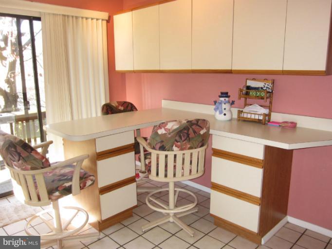 14905 Wellwood Road Silver Spring, MD 20905 - Photo 10 of 30 Kitchen offers breakfast bar seating