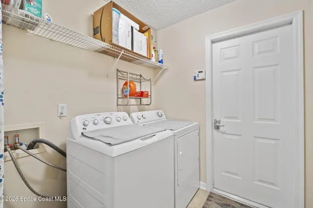 a view of a furniture and floor to ceiling window