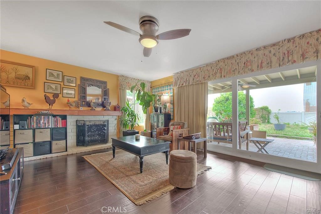1449 Rolling Knoll Road Diamond Bar, CA 91765 - Photo 11 of 31 a living room with fireplace furniture and a large window