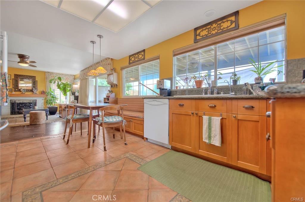 1449 Rolling Knoll Road Diamond Bar, CA 91765 - Photo 13 of 31 a dining hall with stainless steel appliances granite countertop a barbecue grill and cabinets