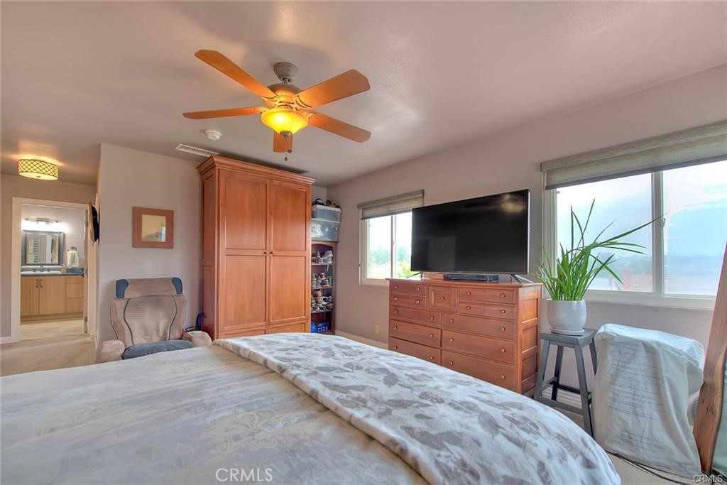 1449 Rolling Knoll Road Diamond Bar, CA 91765 - Photo 18 of 31 a bedroom with a bed and a flat screen tv
