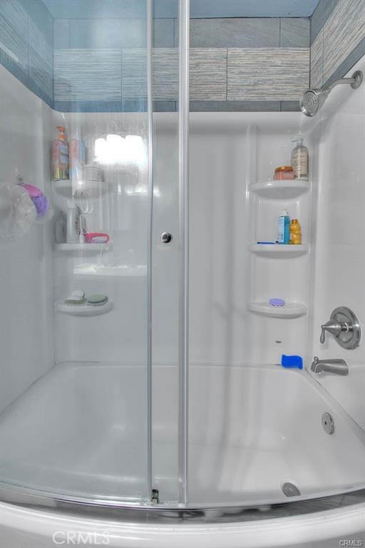 1449 Rolling Knoll Road Diamond Bar, CA 91765 - Photo 26 of 31 a bathroom with a bathtub