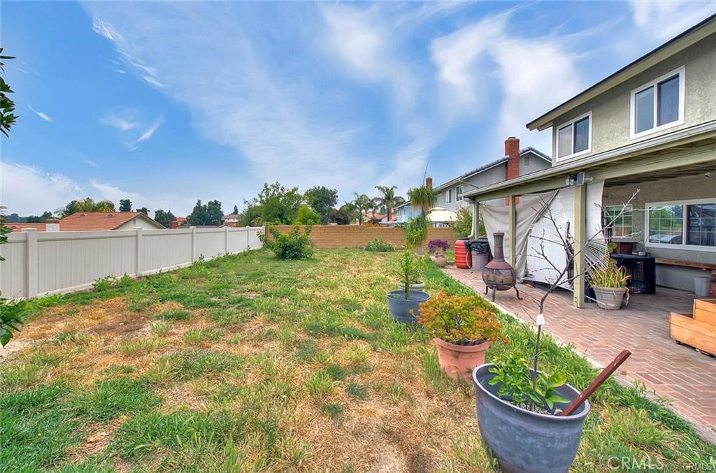 1449 Rolling Knoll Road Diamond Bar, CA 91765 - Photo 29 of 31 a front view of a house with garden