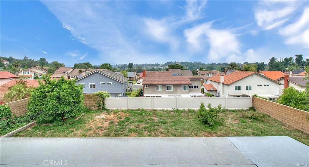 1449 Rolling Knoll Road Diamond Bar, CA 91765 - Photo 4 of 31 an aerial view of residential houses with outdoor space and trees