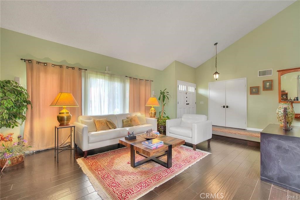 1449 Rolling Knoll Road Diamond Bar, CA 91765 - Photo 6 of 31 a living room with furniture and a large window