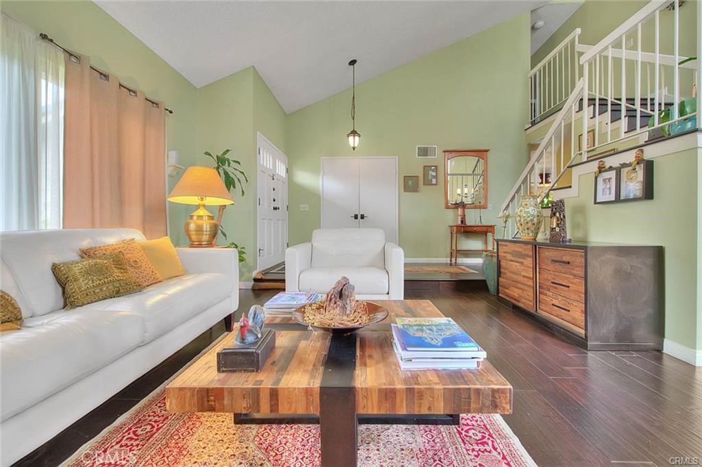1449 Rolling Knoll Road Diamond Bar, CA 91765 - Photo 7 of 31 a living room with furniture and wooden floor