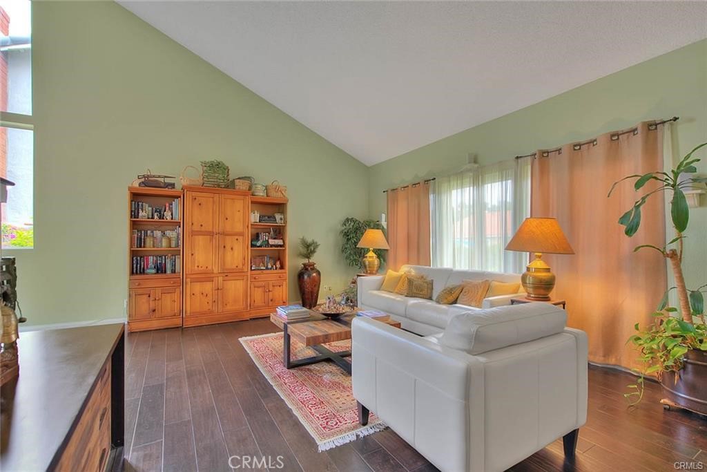 1449 Rolling Knoll Road Diamond Bar, CA 91765 - Photo 8 of 31 a living room with furniture and wooden floor