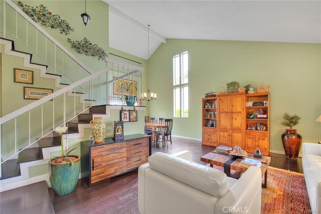 1449 Rolling Knoll Road Diamond Bar, CA 91765 - Photo 9 of 31 a living room with furniture and a chandelier