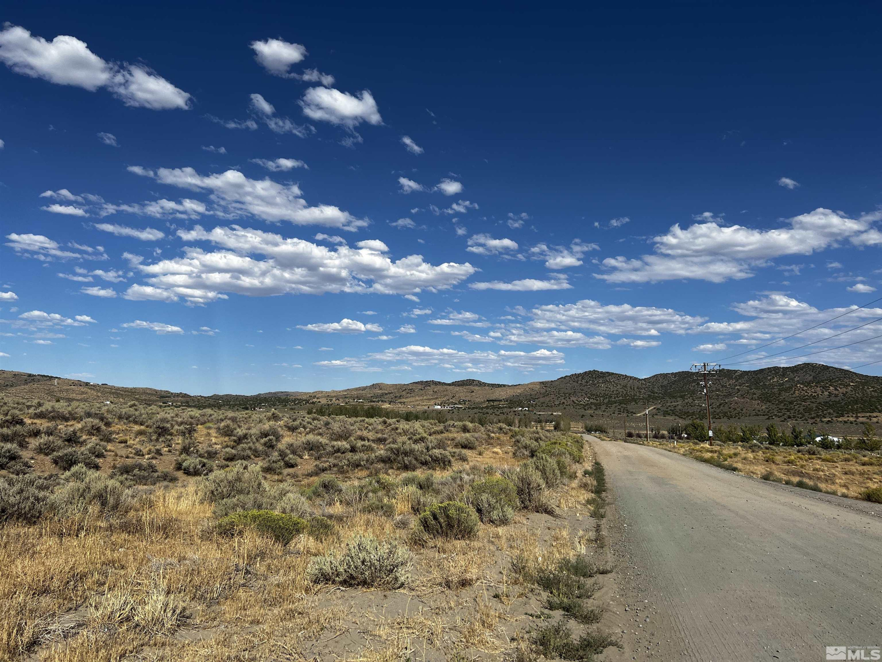 13985 North Red Rock Road, Unit 134 Reno, NV 89508 - Photo 6 of 17 a view of lake and mountain