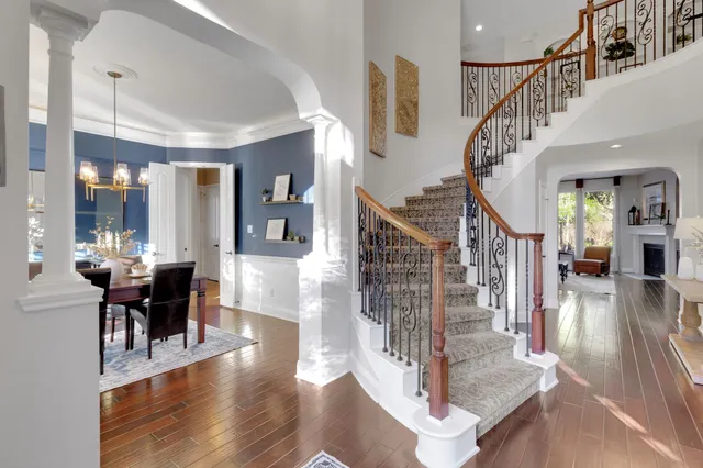 a dining room with a table and chairs
