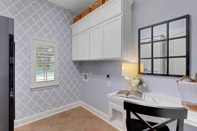 a living room with fireplace furniture and a flat screen tv