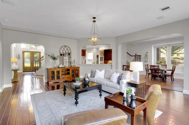 a bathroom with a sink and mirror with toilet