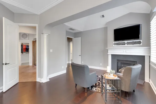a bathroom with a glass shower door and a mirror