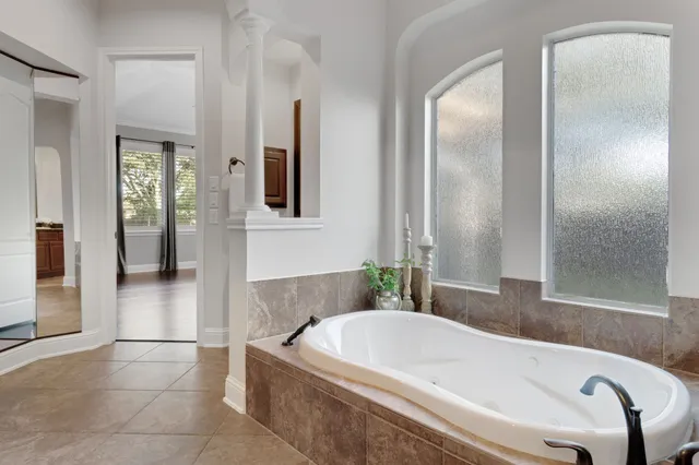 a living room with furniture and window