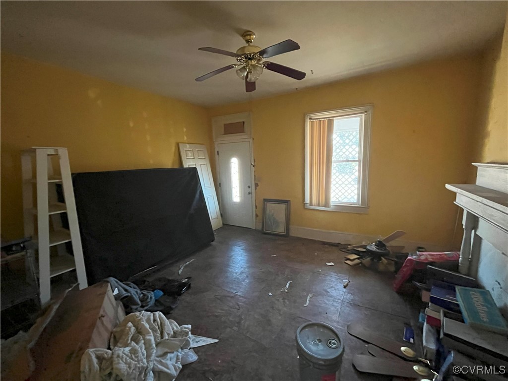 919-921 Rome Street Petersburg, VA 23803 - Photo 11 of 21 a view of a workspace with furniture and a window