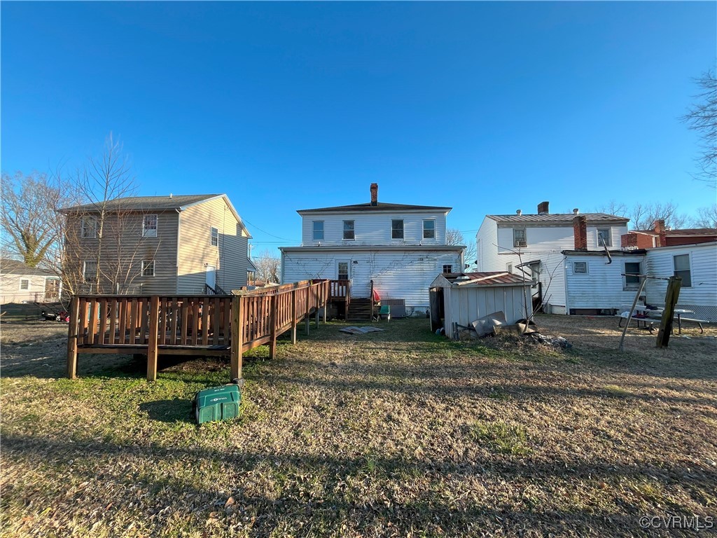 919-921 Rome Street Petersburg, VA 23803 - Photo 19 of 21 a view of a house with a yard and sitting area