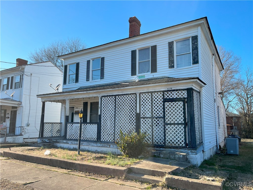 919-921 Rome Street Petersburg, VA 23803 - Photo 21 of 21 a front view of a house with a yard