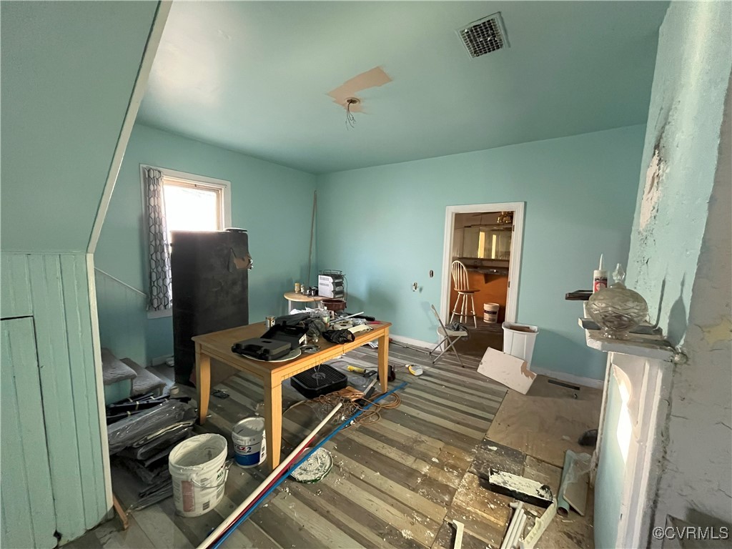 919-921 Rome Street Petersburg, VA 23803 - Photo 3 of 21 a bedroom with furniture and a window