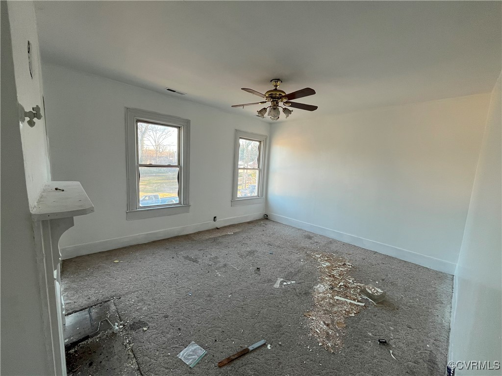 919-921 Rome Street Petersburg, VA 23803 - Photo 9 of 21 a view of empty room with windows
