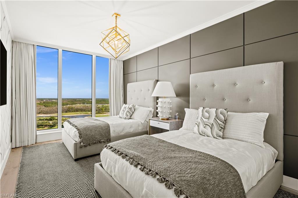 13925 Old Coast Road, Unit 1705 Naples, FL 34110 - Photo 23 of 42 Bedroom with wood finished floors