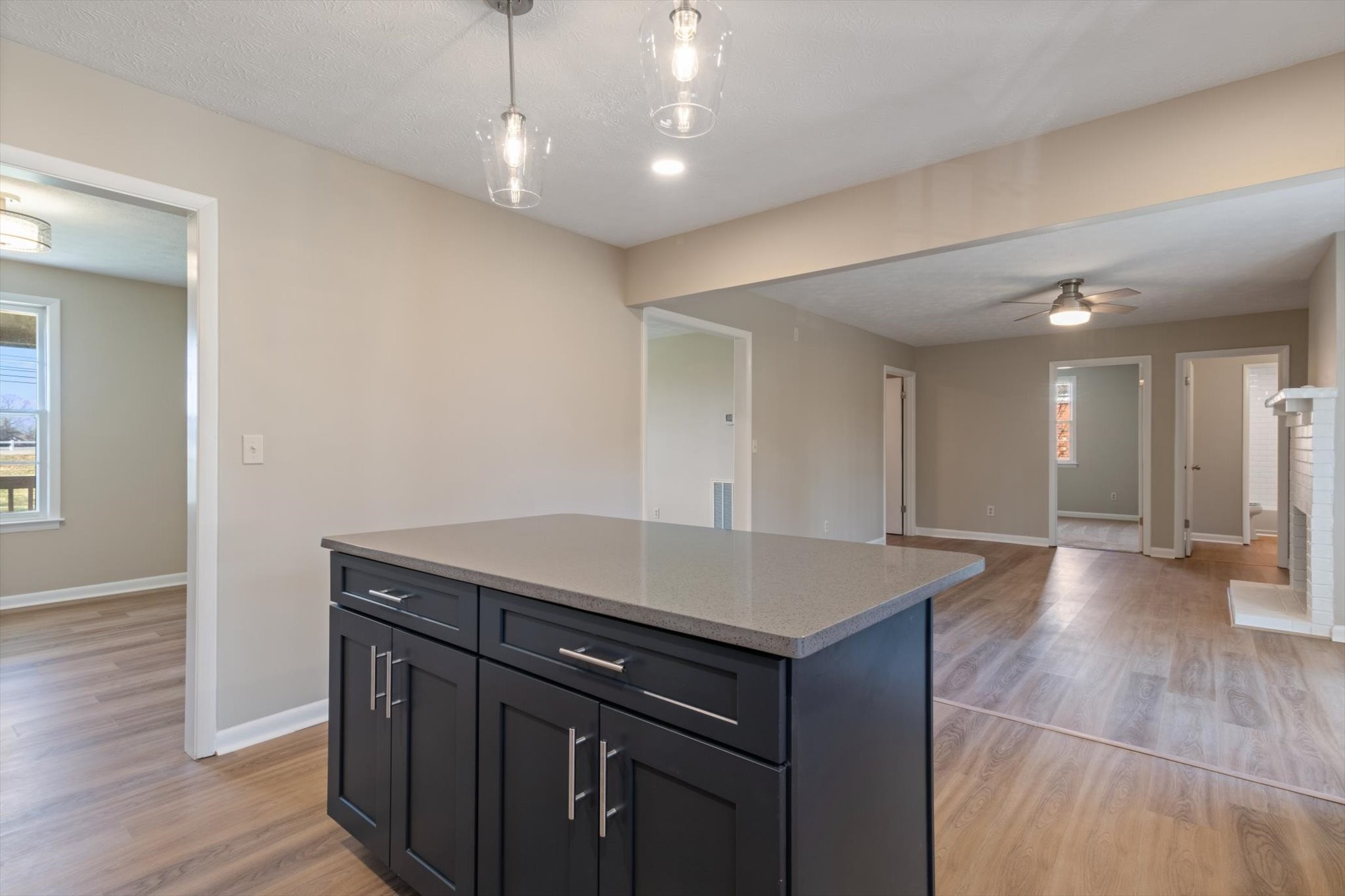 7956 Lebanon Road Murfreesboro, TN 37129 - Photo 12 of 24 a kitchen with a sink a refrigerator and wooden floor
