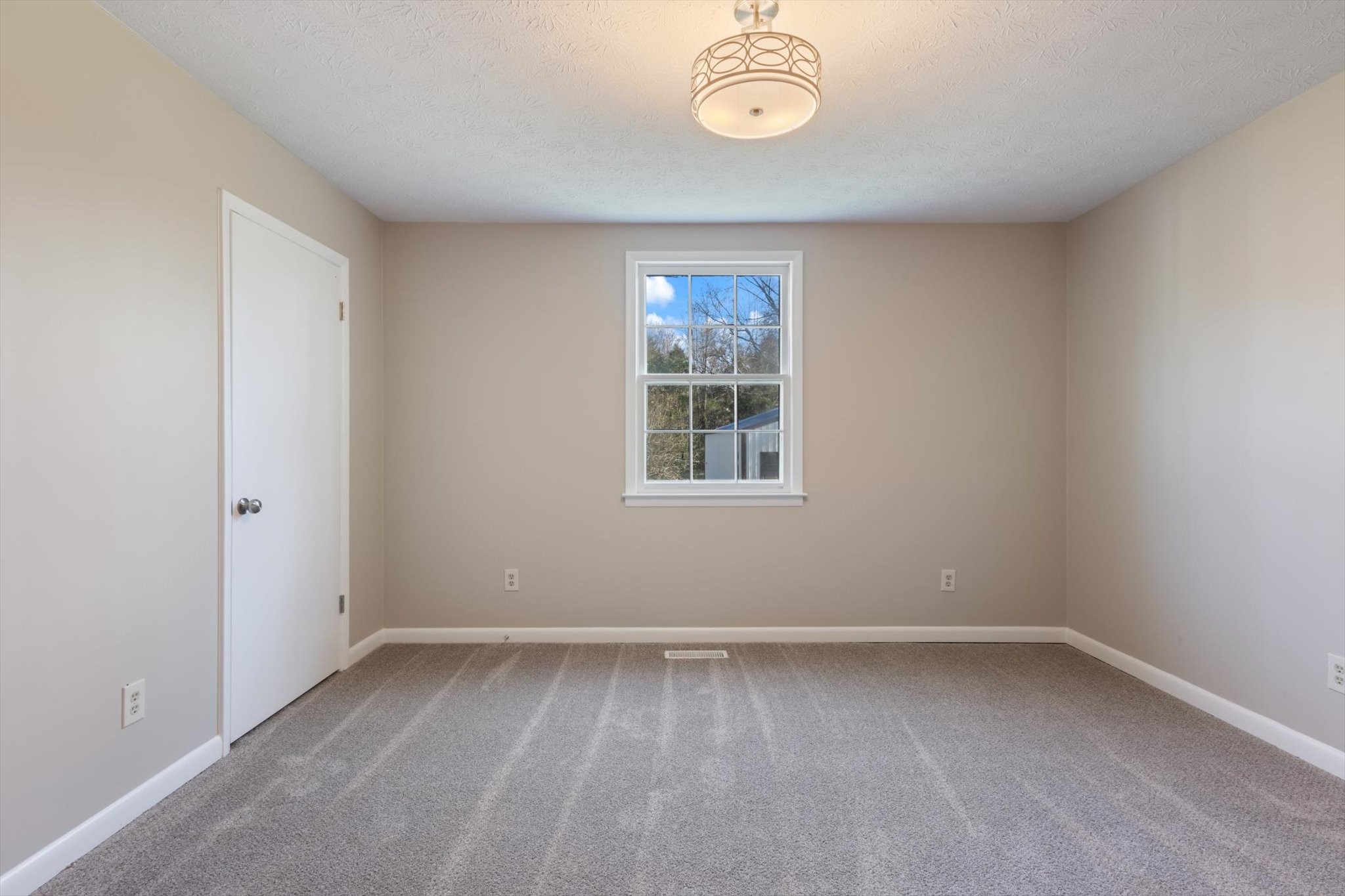 7956 Lebanon Road Murfreesboro, TN 37129 - Photo 20 of 24 an empty room with a window