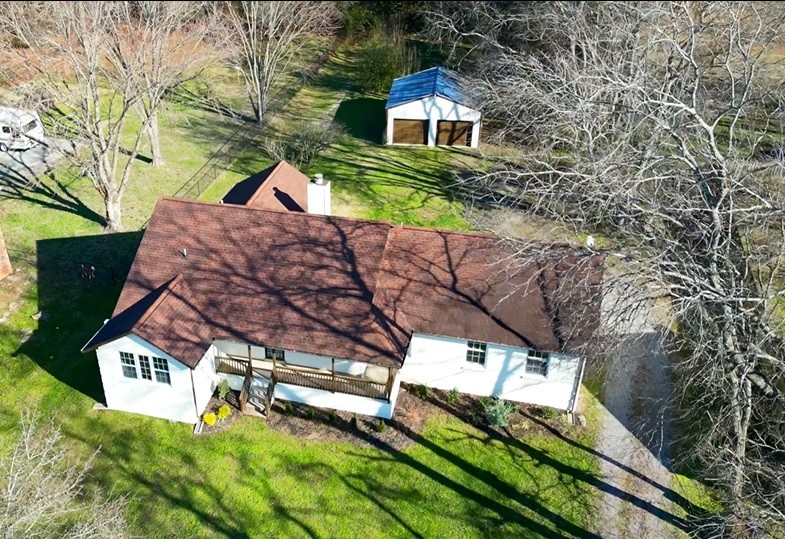 7956 Lebanon Road Murfreesboro, TN 37129 - Photo 2 of 24 a view of a house with a yard