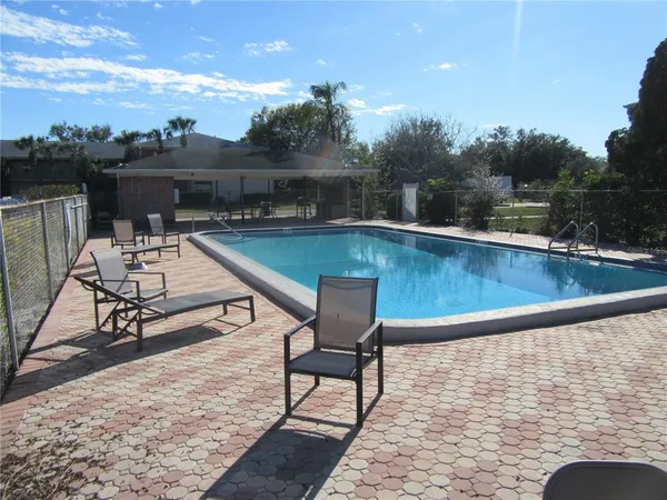 a view of outdoor space and swimming pool