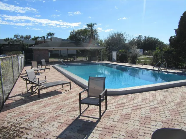 a view of outdoor space and swimming pool