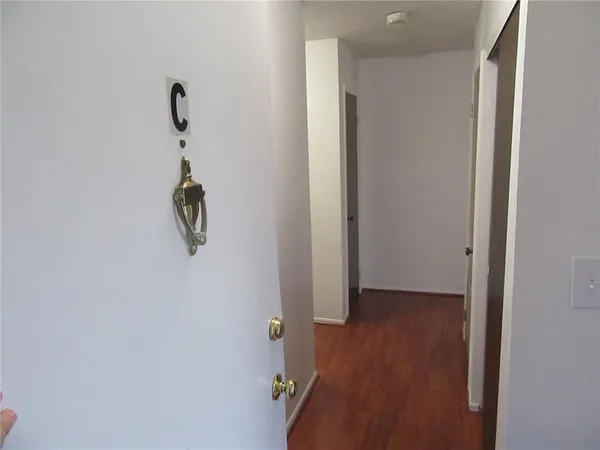 a view of a room with rack on the wall