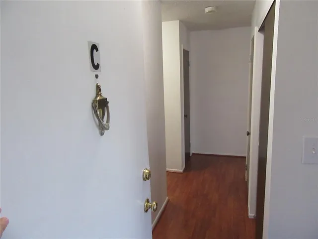 a view of a room with rack on the wall