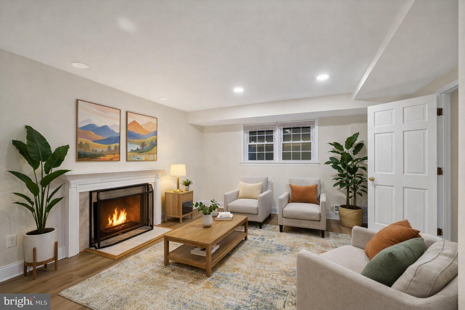 4200 River Road Northwest Washington, DC 20016 - Photo 12 of 52 a living room with furniture a window and a fireplace