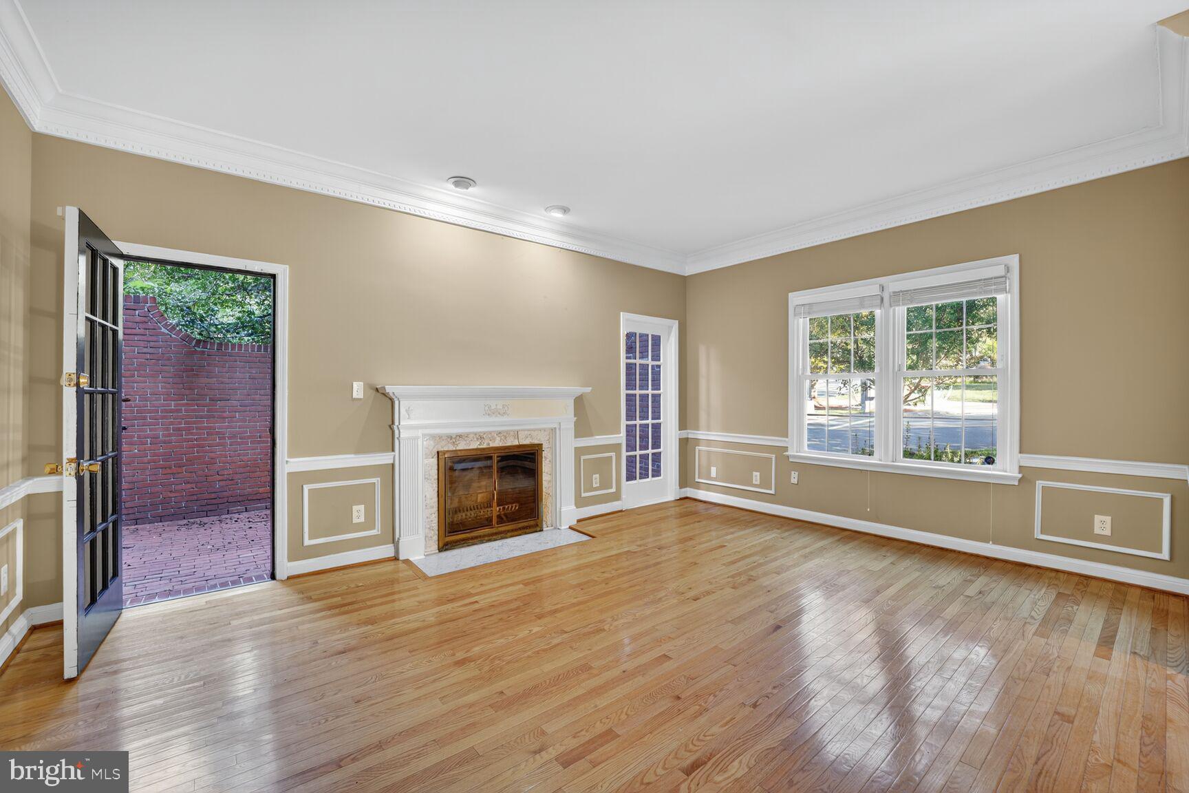 4200 River Road Northwest Washington, DC 20016 - Photo 18 of 52 a view of an empty room with a window and fireplace