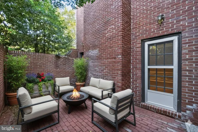 a building outdoor space with patio furniture