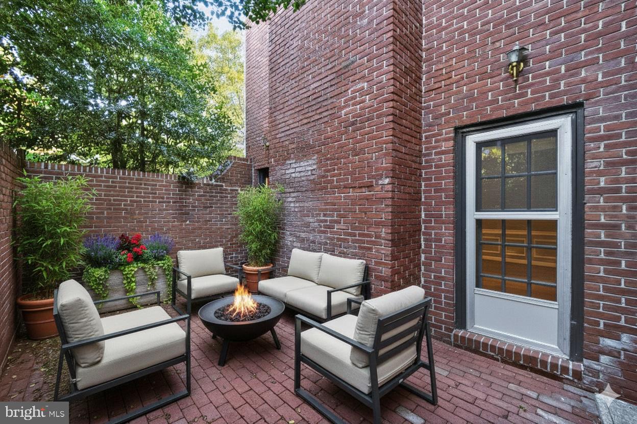 4200 River Road Northwest Washington, DC 20016 - Photo 2 of 52 a building outdoor space with patio furniture