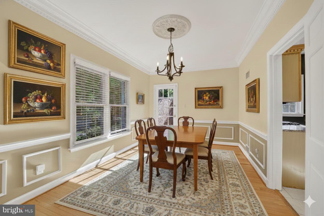 4200 River Road Northwest Washington, DC 20016 - Photo 4 of 52 a view of a dining room with furniture window and wooden floor