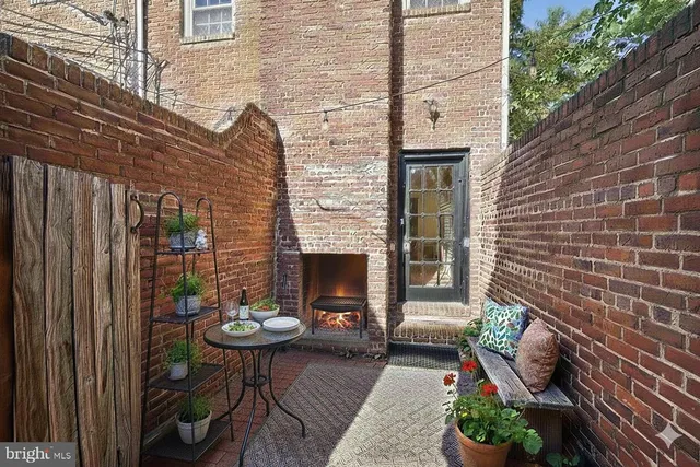 a front view of a house with a patio