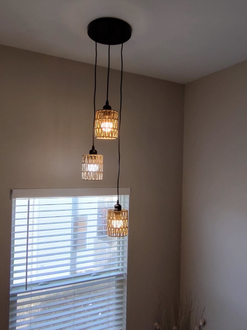 1404 Roth Drive Joliet, IL 60431 - Photo 26 of 52 a room with a chandelier fan and a window