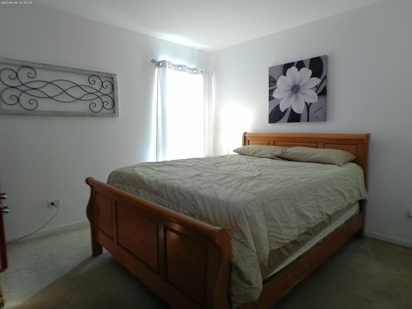 1404 Roth Drive Joliet, IL 60431 - Photo 38 of 52 a bedroom with a bed and painting on the wall