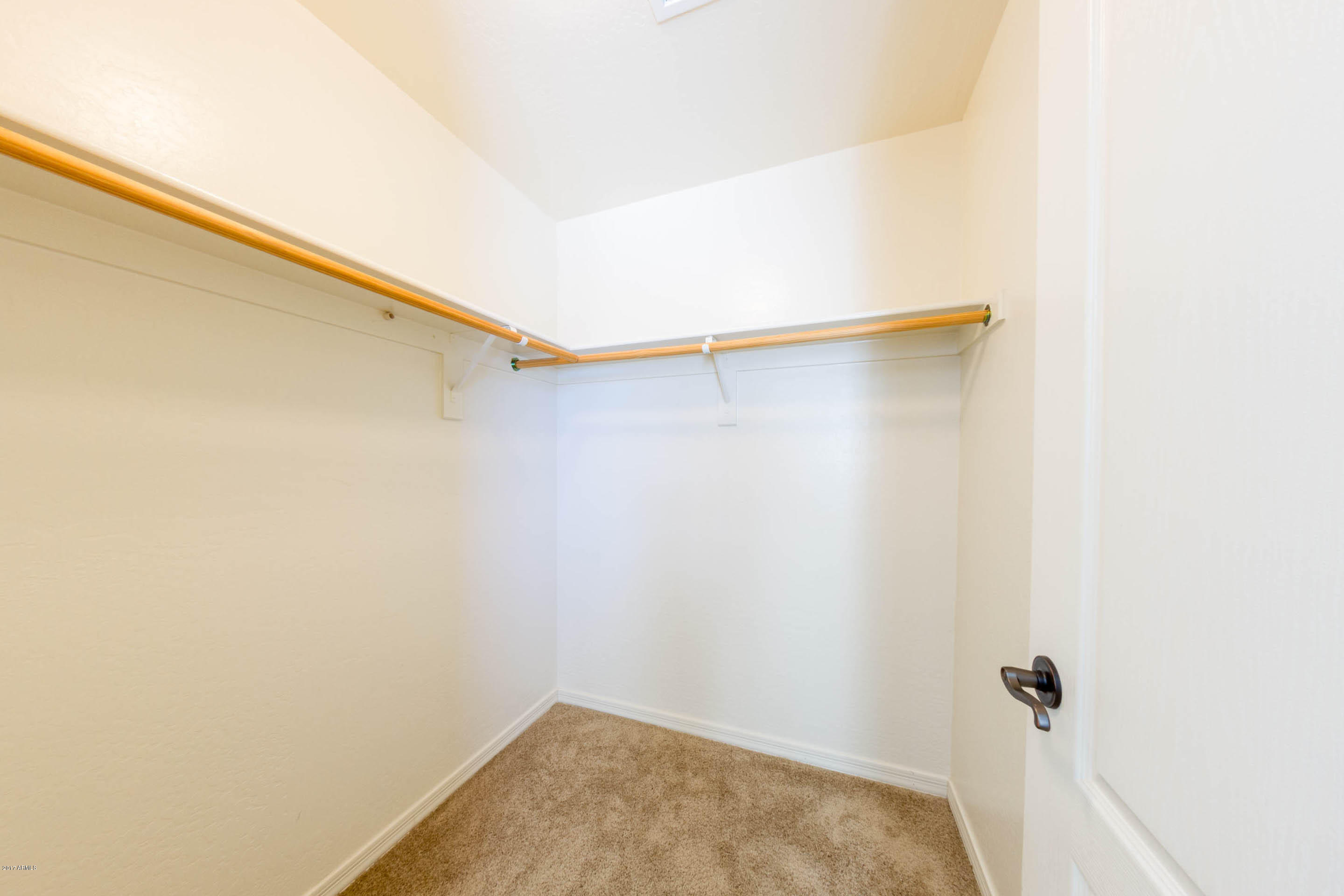 16495 West Rowel Road Surprise, AZ 85387 - Photo 18 of 27 guest bedroom walk in closet