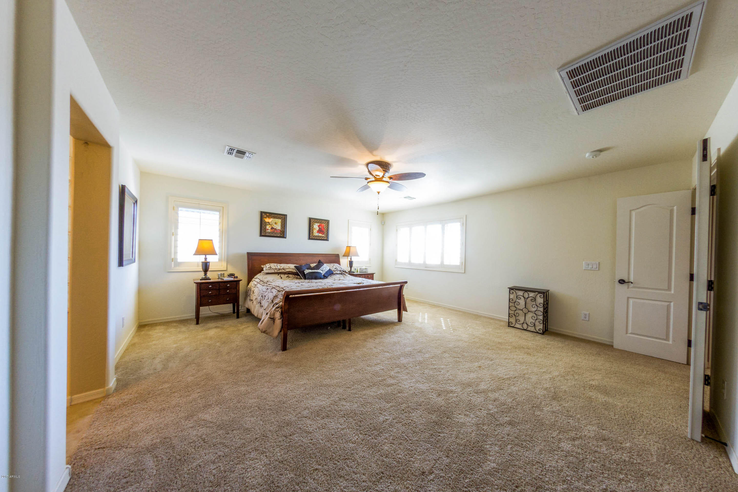 16495 West Rowel Road Surprise, AZ 85387 - Photo 19 of 27 master bedroom