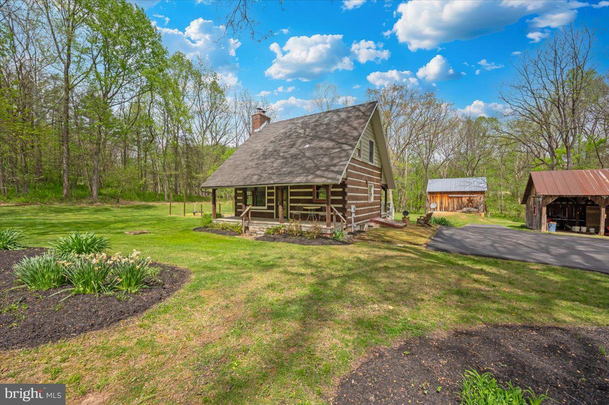 16926 Sprecher Road Sharpsburg, MD 21782 - Photo 62 of 76 Charming log cabin in serene nature.
