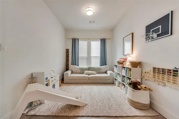 a living room with furniture and a couch