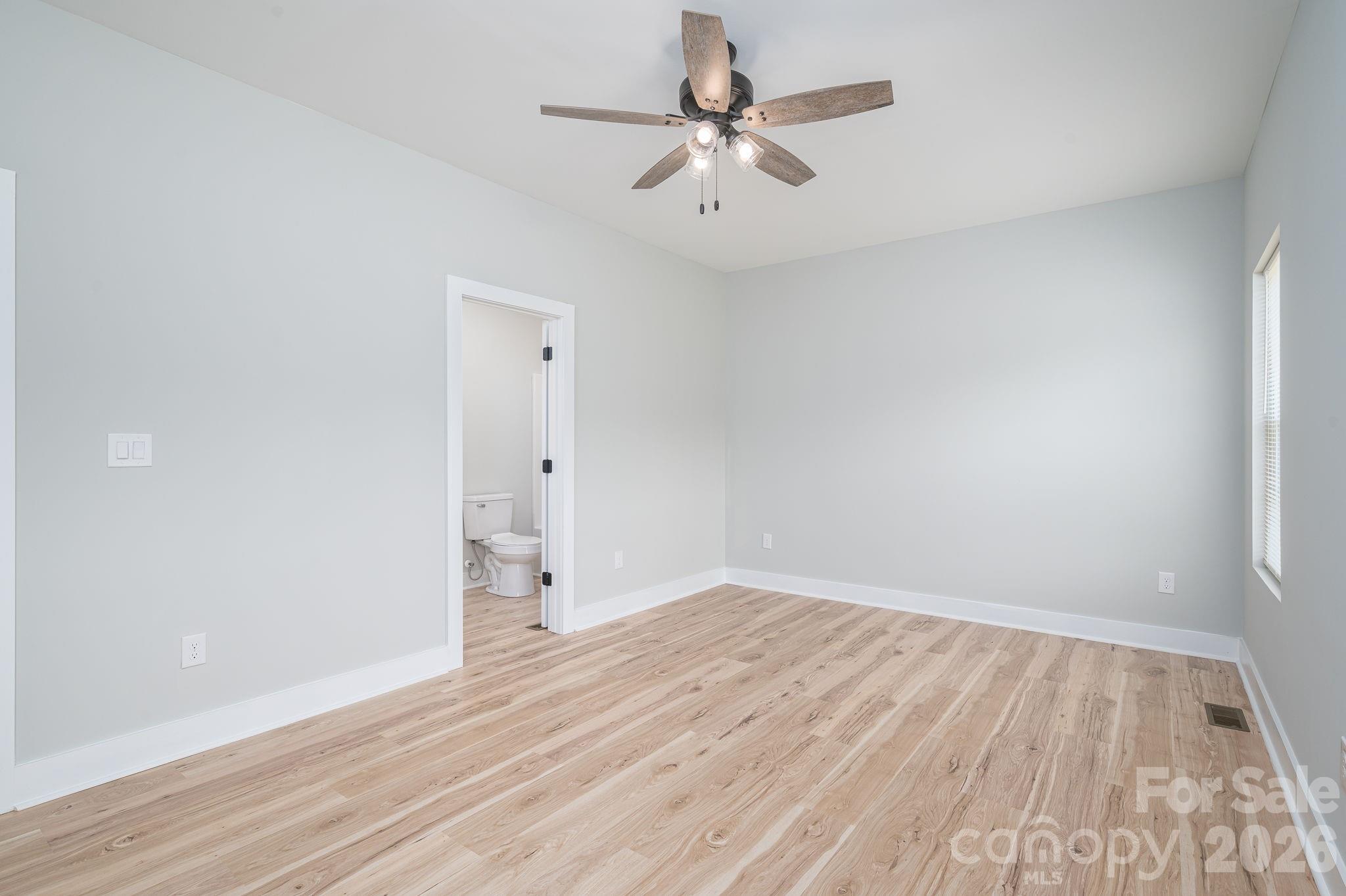 2474 Shoal Road Crouse, NC 28033 - Photo 22 of 39 wooden floor in an empty room